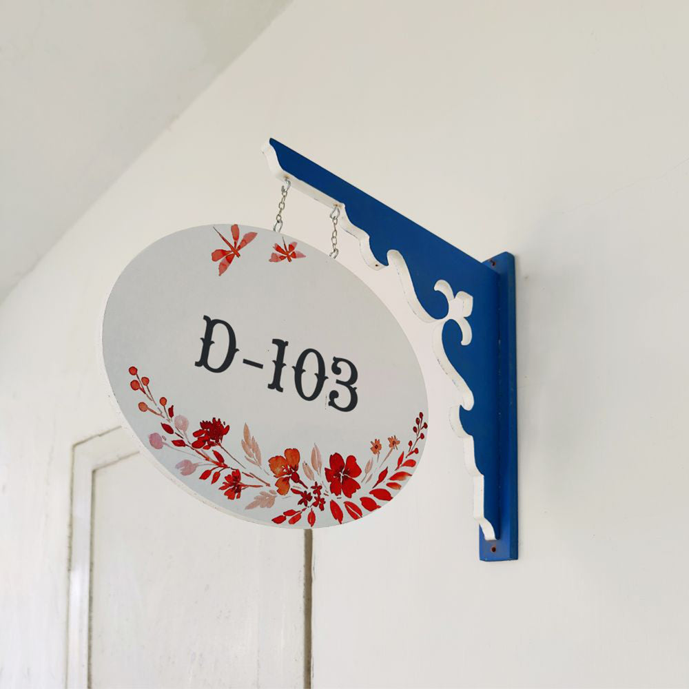 Hand Painted Oval Hanging Floral Name Plate - Side View Hanging on Wall Bracket