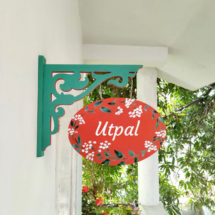 Hand Painted Oval Hanging Floral Name Plate 2 - Hanging Side View on Wall Bracket