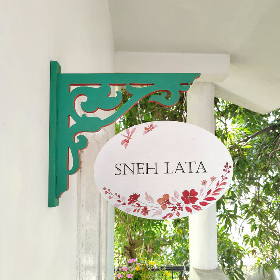 Hand Painted Oval Hanging Floral Name Plate 3 - Side View Hanging from Bracket