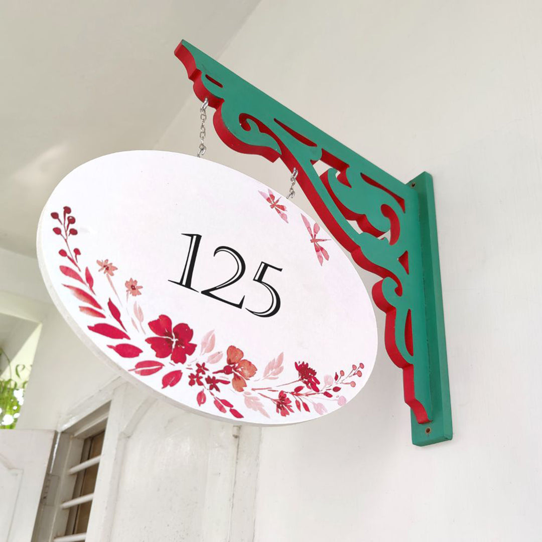 Hand Painted Oval Hanging Floral Name Plate 3 - Side View Hanging on Bracket