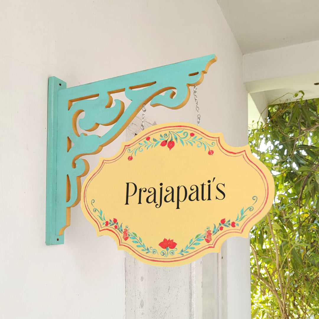 Hand Painted Victorian Oval Cut Hanging Name Plate 2 - Side View Hanging on Wall Bracket