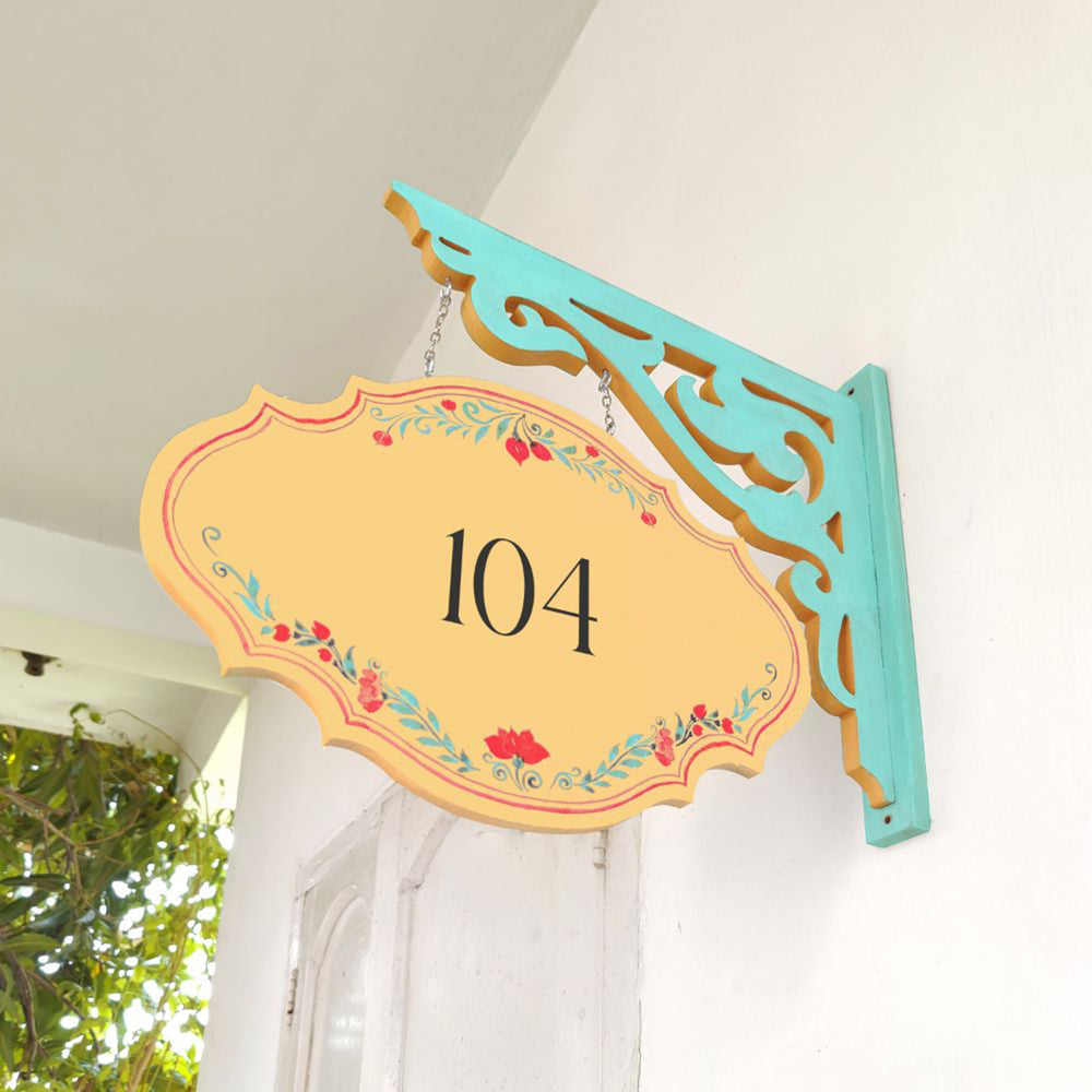 Hand Painted Victorian Oval Cut Hanging Name Plate 2 - Side View Hanging from Bracket