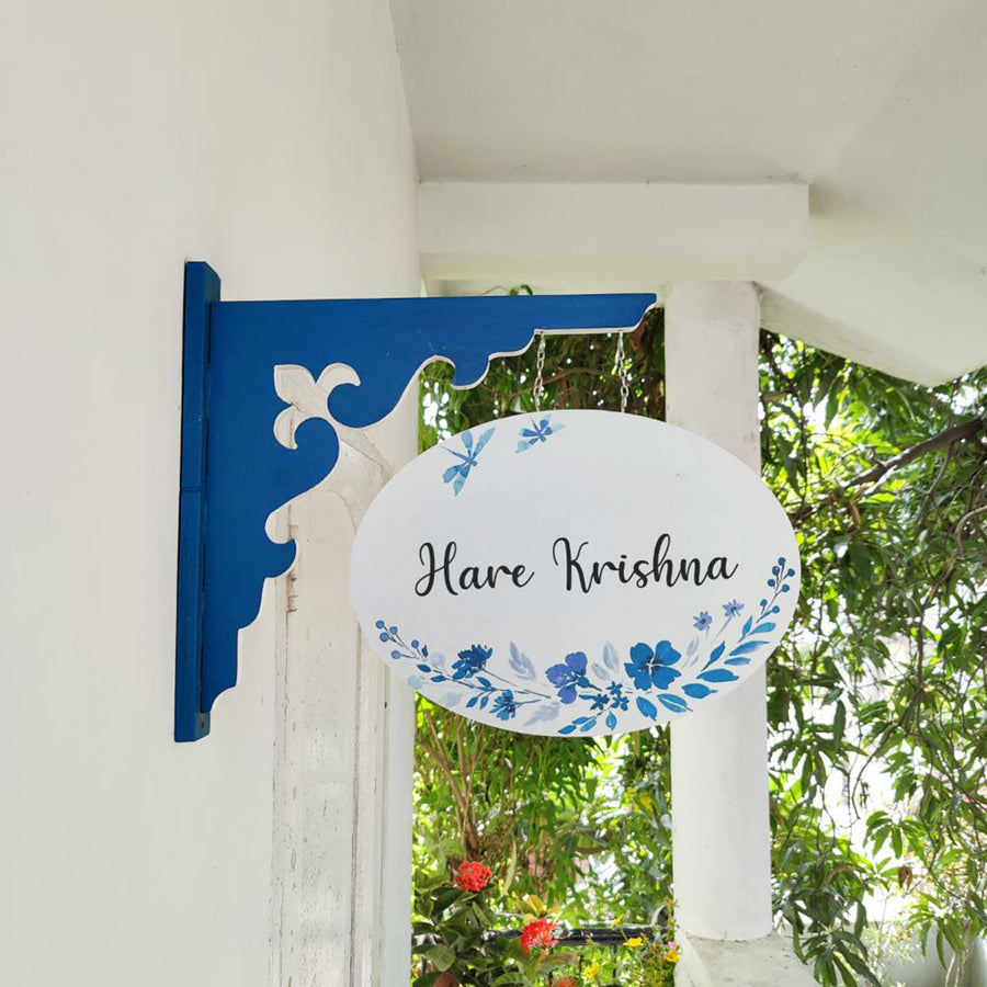 Hand Painted Oval Hanging Floral Name Plate 5 - Hanging Side View on Wall Bracket