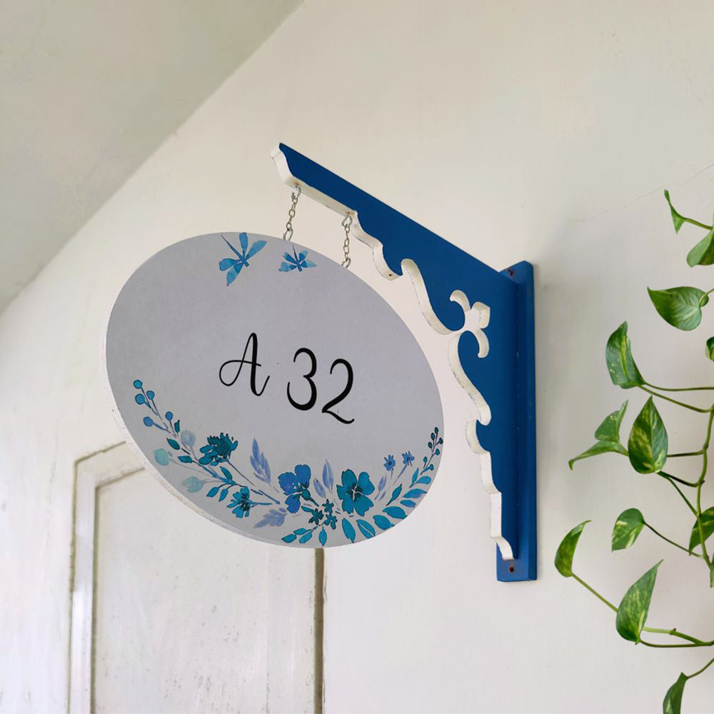 Hand Painted Oval Hanging Floral Name Plate 5 - Side View Hanging on Wall Bracket