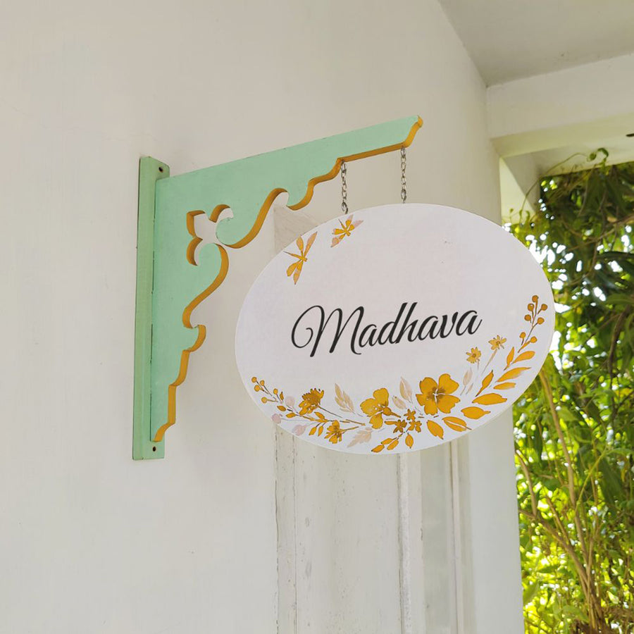 Hand Painted Oval Hanging Floral Name Plate 6 - Side View Hanging on Wall Bracket