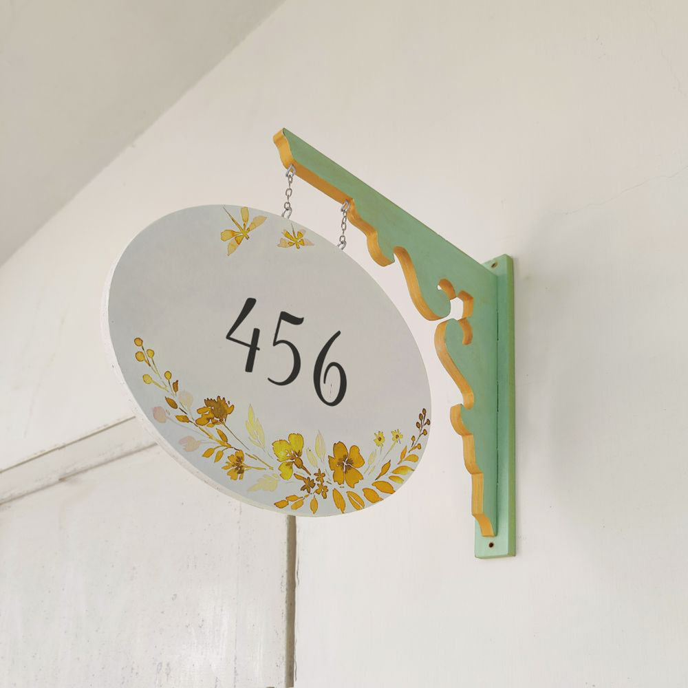 Hand Painted Oval Hanging Floral Name Plate 6 - Side View Hanging from Bracket