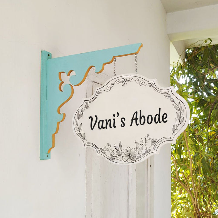 Hand Painted Victorian Oval Cut Hanging Name Plate 5 - Side View Hanging from Wall Bracket