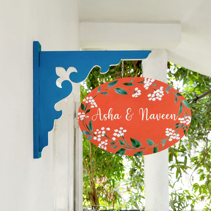 Hand Painted Oval Hanging Floral Name Plate 7 - Side View Hanging from Bracket