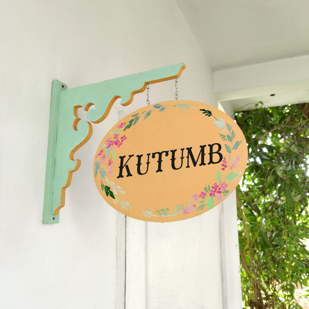 Hand Painted Oval Hanging Floral Name Plate 9 - Mounted on Wall Bracket Side View