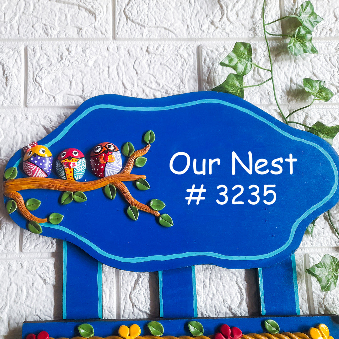 Handmade Owl Family Name Plate With Personalised Clay Figures - Front View Hanging on Wall