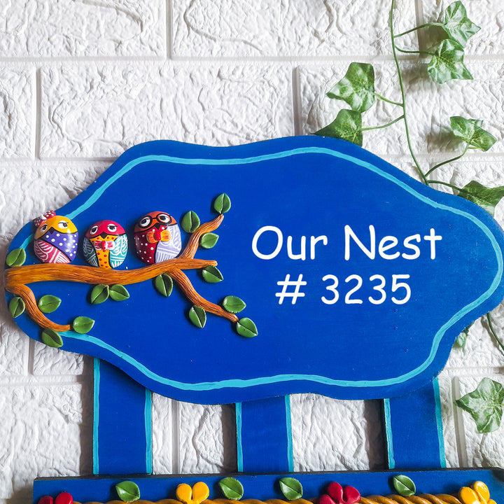 Handmade Owl Family Name Plate With Personalised Clay Figures - Front View Hanging on Wall