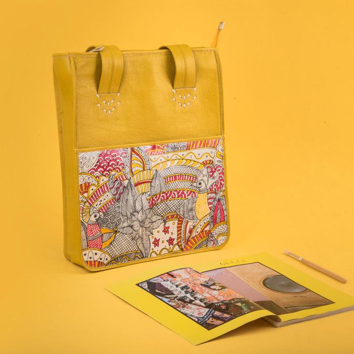 Peacock Minimal Tholu Bommalata Art | Yellow Genuine Leather Everyday Tote Bag With Outer Handpainted Pocket