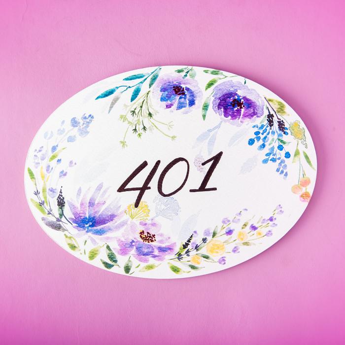 Oval Hand Painted Name Plate 23 - Front View on Pink Background