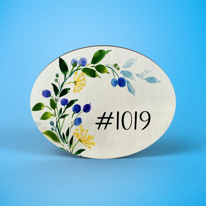 Oval Hand Painted Name Plate 24 - Front View on Blue Background