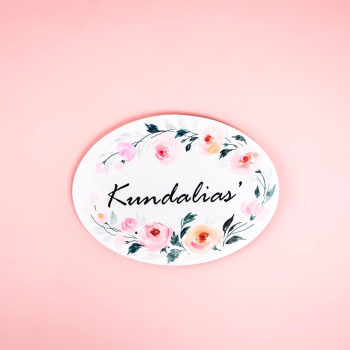 Oval Hand Painted Name Plate 2 - Front View on Pink Background