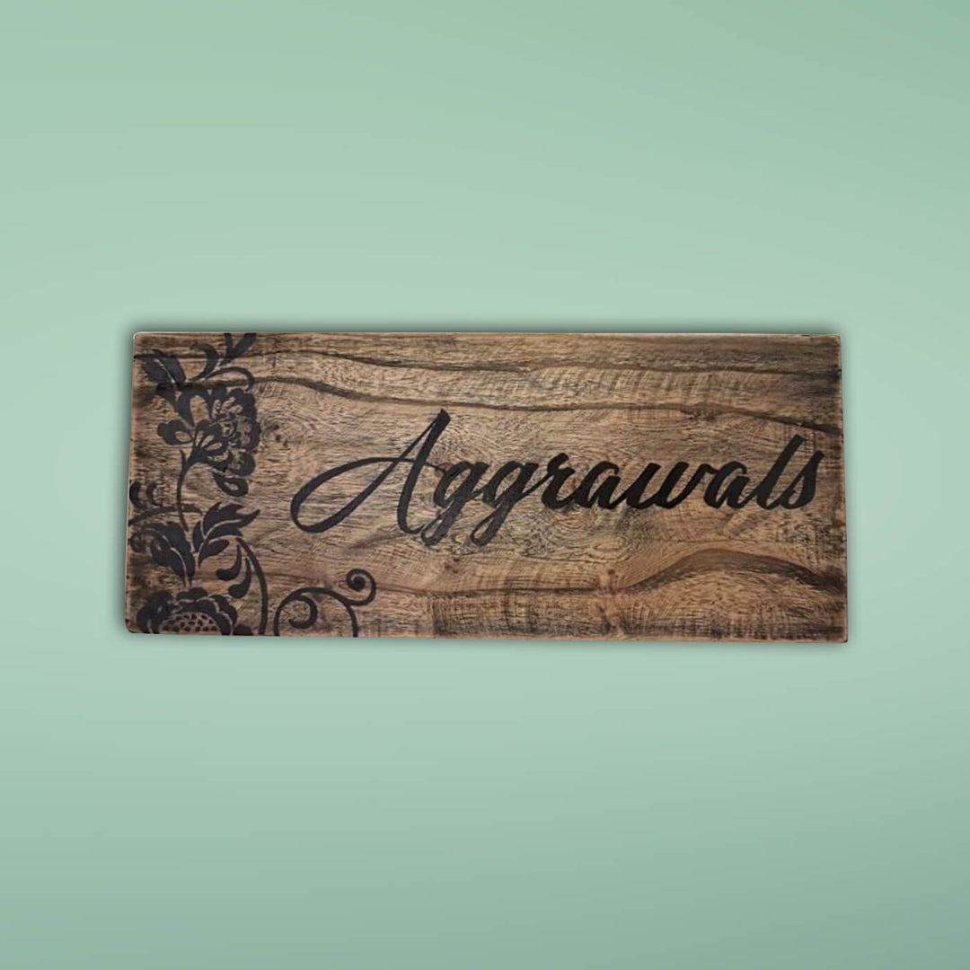 Natural Wood Hand Painted Family Name Plate - Top-Down View on Plain Background