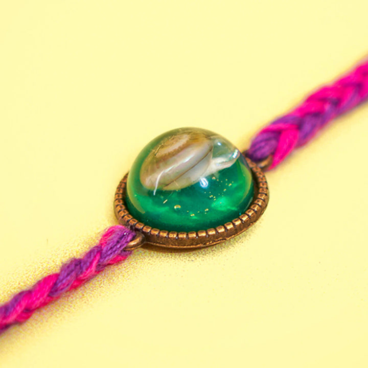 Handcrafted Bio Resin Shell Rakhi