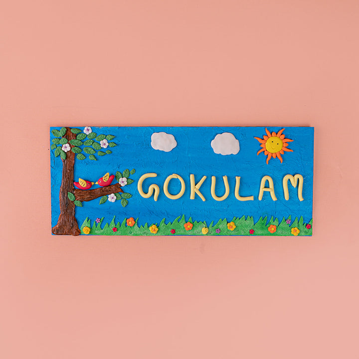 Customised Clay Family Name Plate - Front View on Wall Background