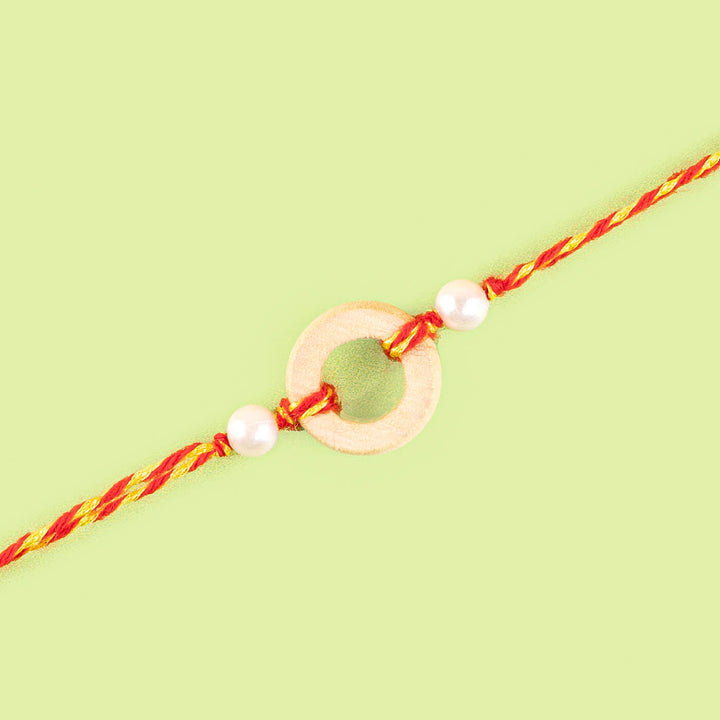 Ecofriendly Solid Round Bamboo Rakhi - Flat lay star bead detail
