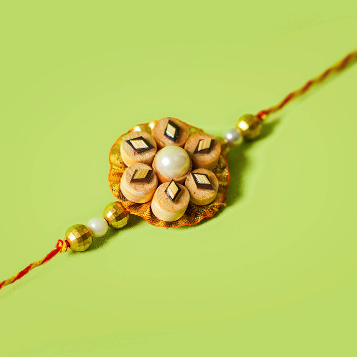 Ecofriendly Bamboo Rakhi With Golden Bead - Flat Lay Front View (18)