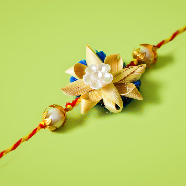 Ecofriendly Solid Round Bamboo Rakhi - Side angle floral close-up
