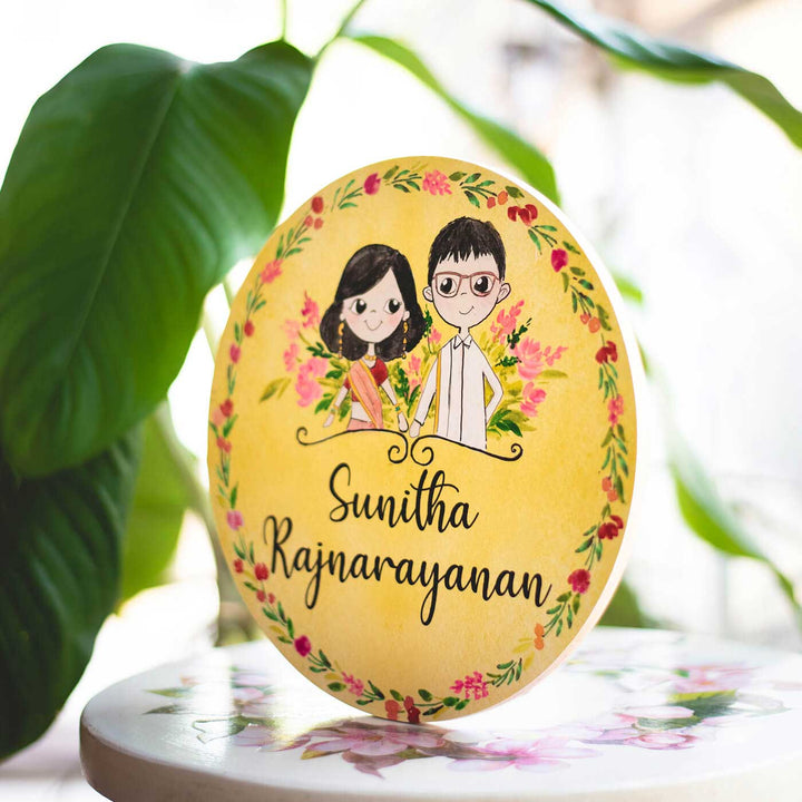 Round Hand Painted Character Name Plate South Indian Couple 2 - Name Personalization Example Front View