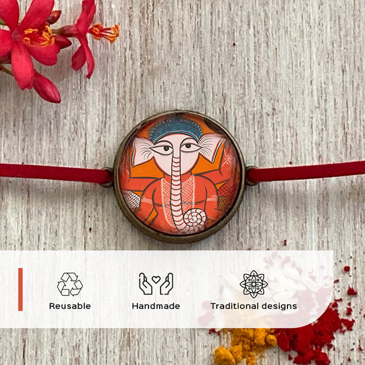 Gond Elephant Handcrafted Folkart Rakhi - Front View with Icons