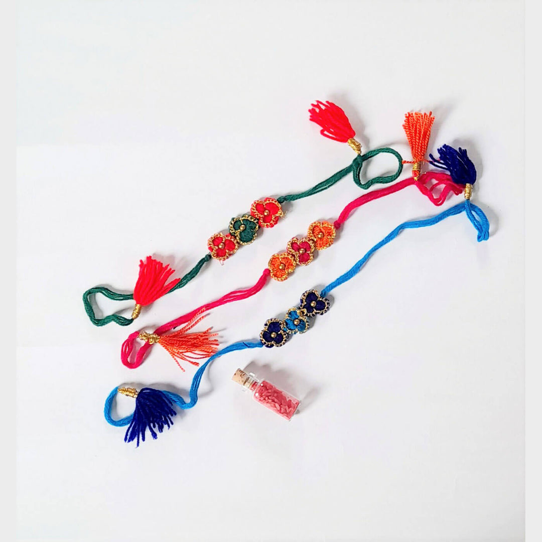 Crochet Rakhi Set Three Flowers - Flat Lay with Multiple Bracelets