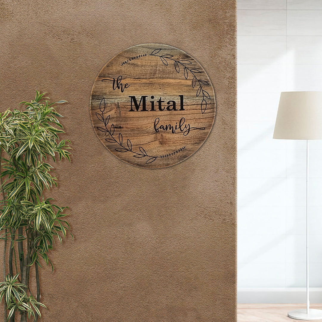 Round Rustic Wood Hand Painted Family Name Plate - Mounted on Textured Wall