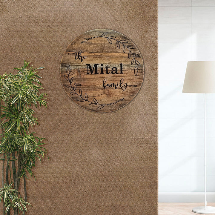 Round Rustic Wood Hand Painted Family Name Plate - Mounted on Textured Wall