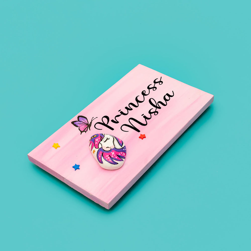 Handpainted Unicorn Pebble Art And Wood Kids Name Plate - Angled Top View with Personalization