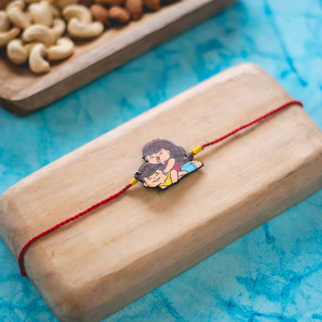Sibling Illustration Rakhi Type 3 - Rakhi styled on wooden tray