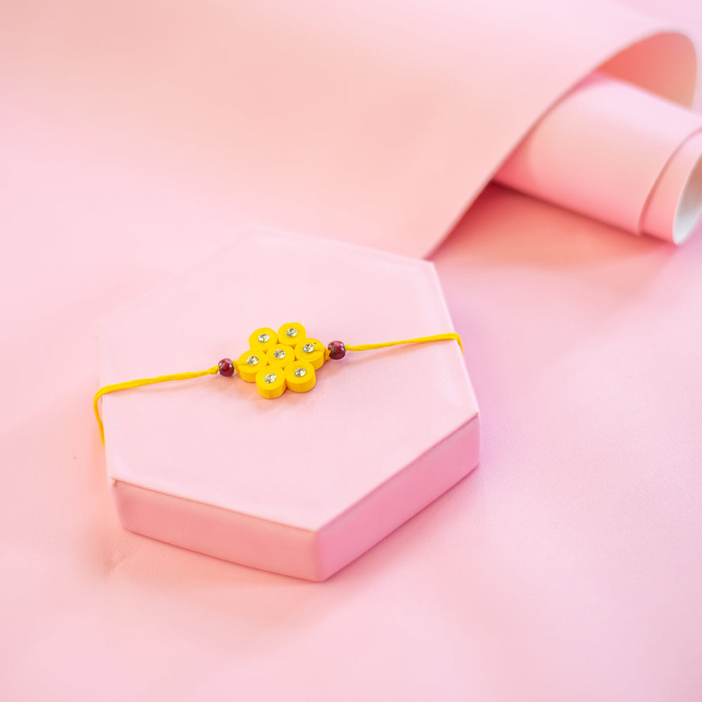 Paper Mache Rakhi Bhaiyya Bhabhi Set Yellow - Styled on Display Stand