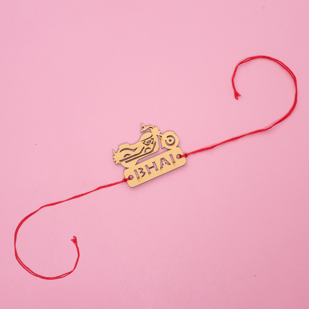 Bullet Bhai Mdf Rakhi - Flat lay of Rakhi with string extended