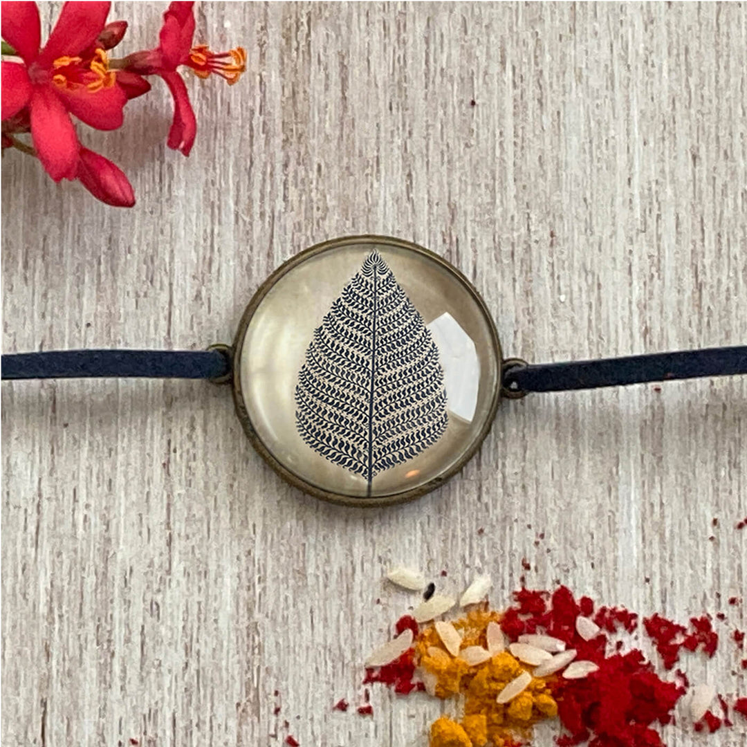 Bhil Turtle Handcrafted Folkart Rakhi - Close-up Front View Leaf