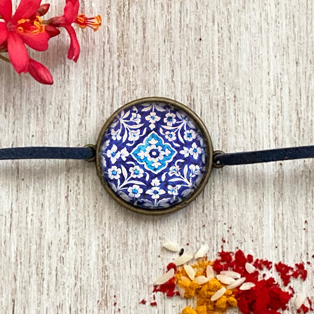 Lord Ganesha Kalighat Pat Folkart Rakhi - Close-up Front View Blue Tile Design