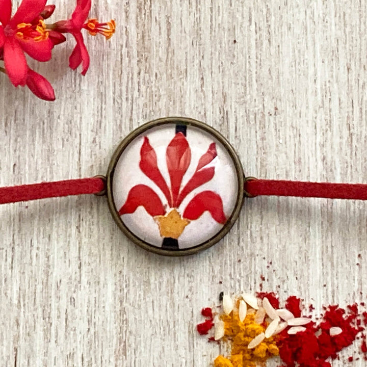 Gond Elephant Handcrafted Folkart Rakhi - Front View with Ritual Detail