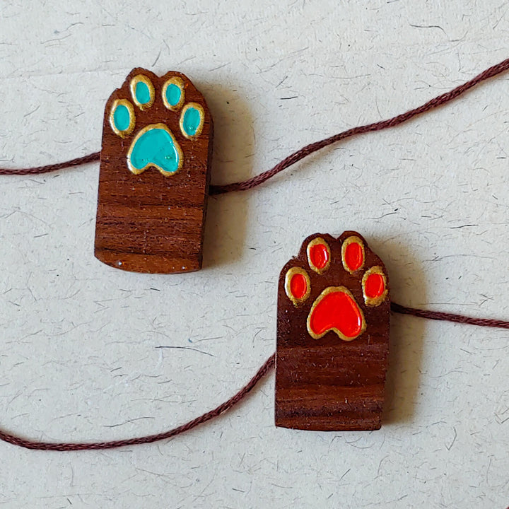 Handpainted Wooden Rakhi Set Of 2 Cats - Paw Print Design Front View