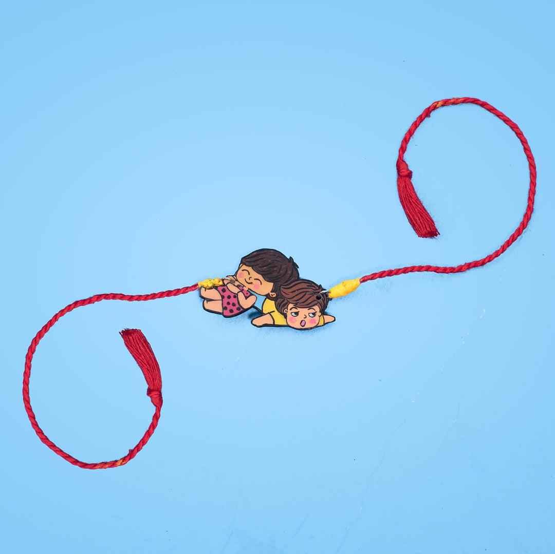 Sibling Illustration Rakhi Type 2 - Full Rakhi layout on surface
