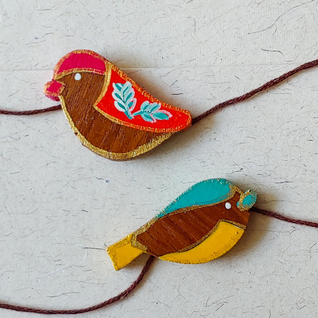 Handpainted Wooden Rakhi Set Of 2 Icrecream - Close-up Front View Bird Design