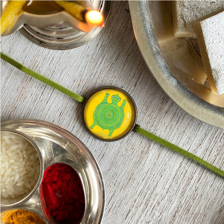 Bhil Turtle Handcrafted Folkart Rakhi - Rakhi Near Puja Plate