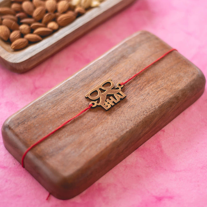 Sunglasses Mustache Bhai Mdf Rakhi - Rakhi displayed on wooden tray