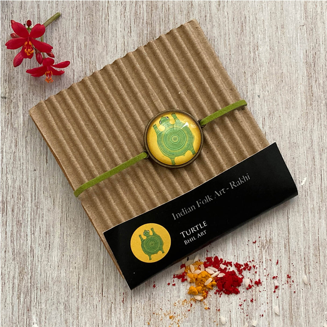 Bhil Turtle Handcrafted Folkart Rakhi - Packaged Rakhi on Cardboard