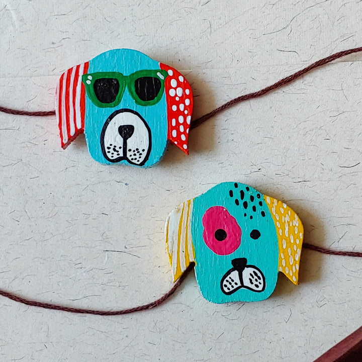 Handpainted Wooden Rakhi Set Of 2 Mini Birds - Close-up of dog face designs