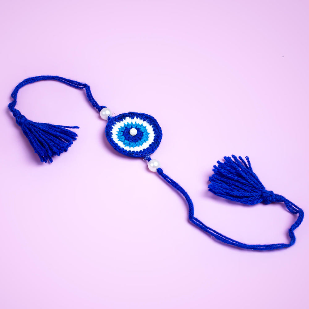 Crochet Rakhi Set Zari Rakhi With Dabu Printed Mask - Full View with Tassels