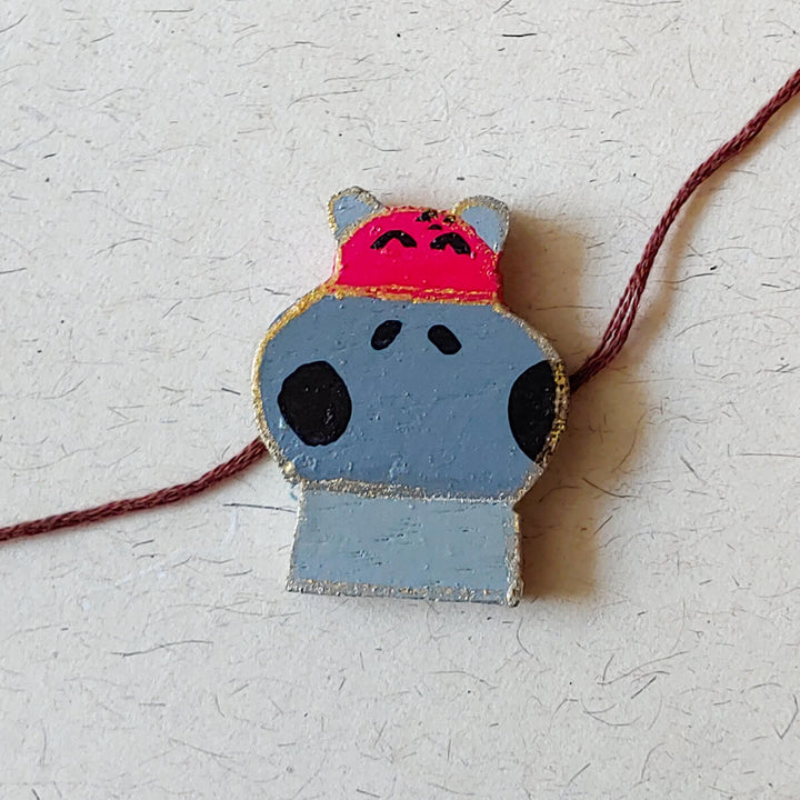 Handpainted Wooden Rakhi Donut - Close-up of Hippo Bracelet