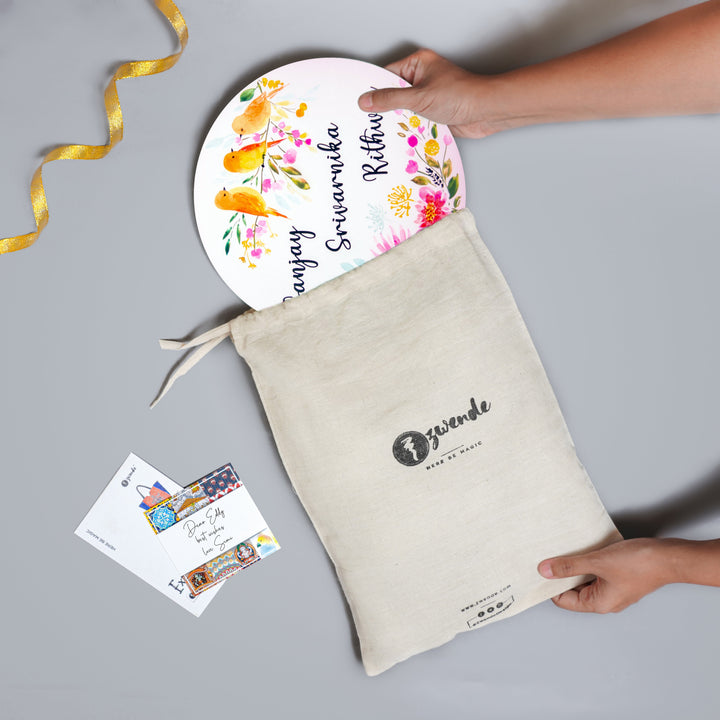 Copy Of Circle Hand Painted Name Plate 1 - Product Being Removed From Packaging Bag