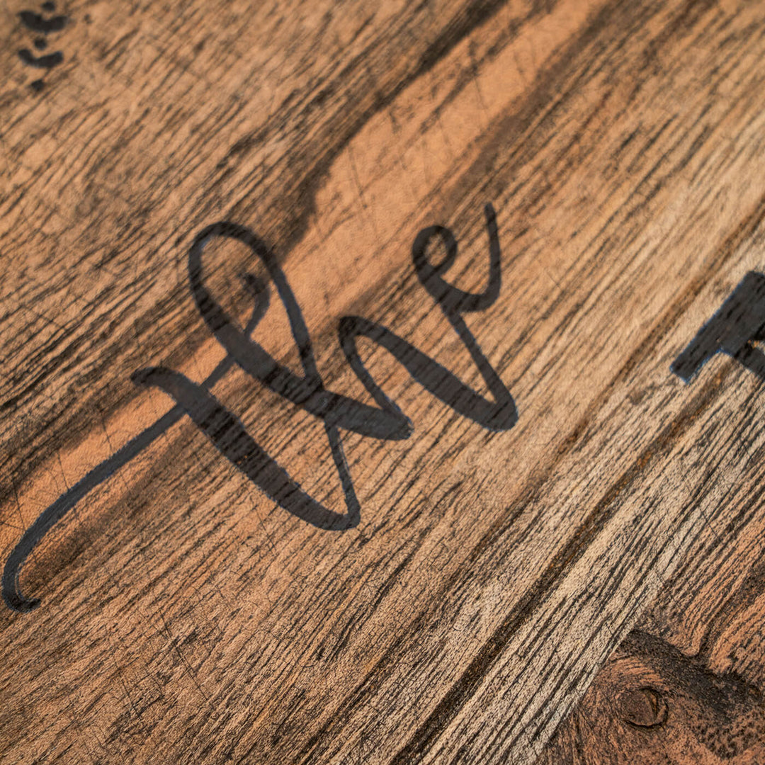 Round Rustic Wood Hand Painted Family Name Plate - Engraving Close-up on Wood Surface