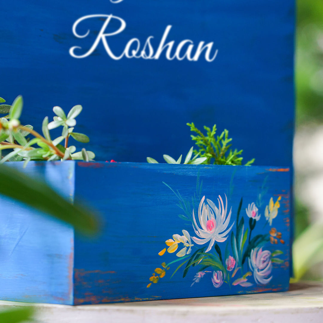 Handpainted Half Planter Name Plate White Flowers On Dark Blue Wood - Close-up of Hand-painted Side Detail