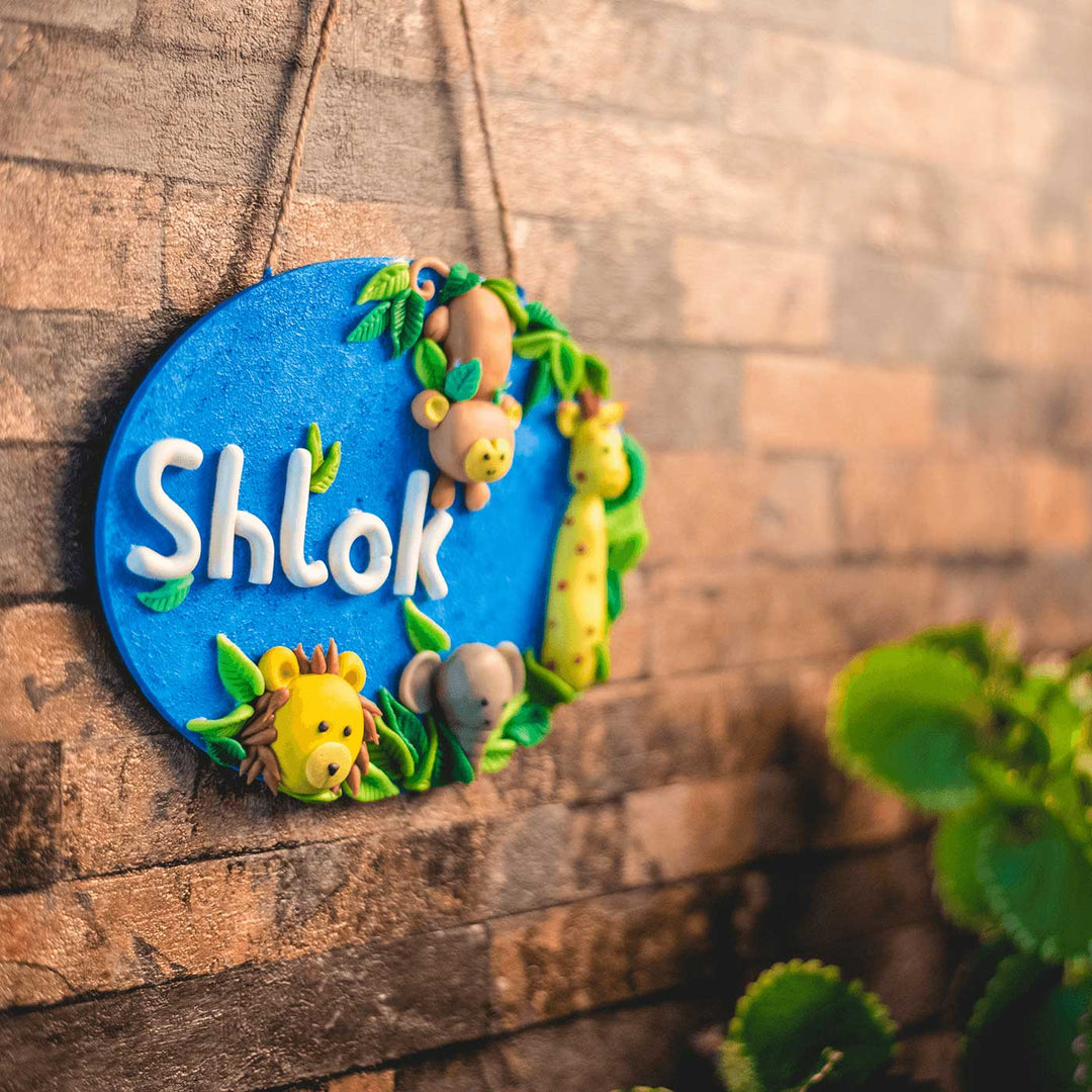 Jungle Theme Clay Kids Name Plate - Hanging on Rope Against Wall